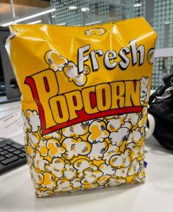 Picture of a yellow bag of fresh popcorn